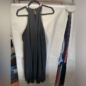 Xxl black dress with bling accent.  Can’t find the tags with the brand name.